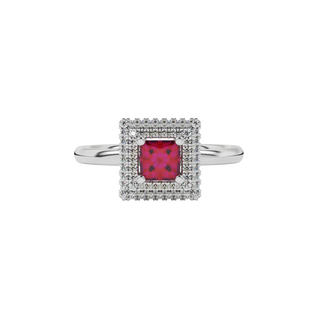 Close-up raspberry red gemstone, white gold diamond halo.