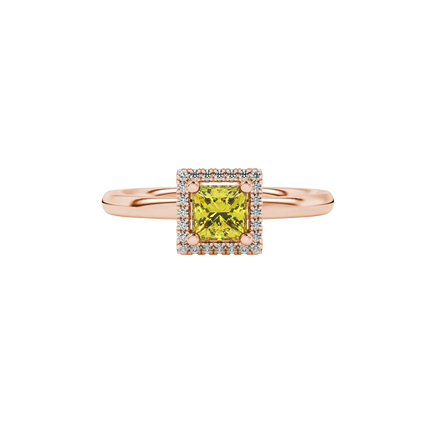 Close-up, princess canary yellow gemstone ring, rose gold pavé setting.
