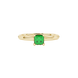 Close-up, princess emerald green gemstone, yellow gold lotus ring.