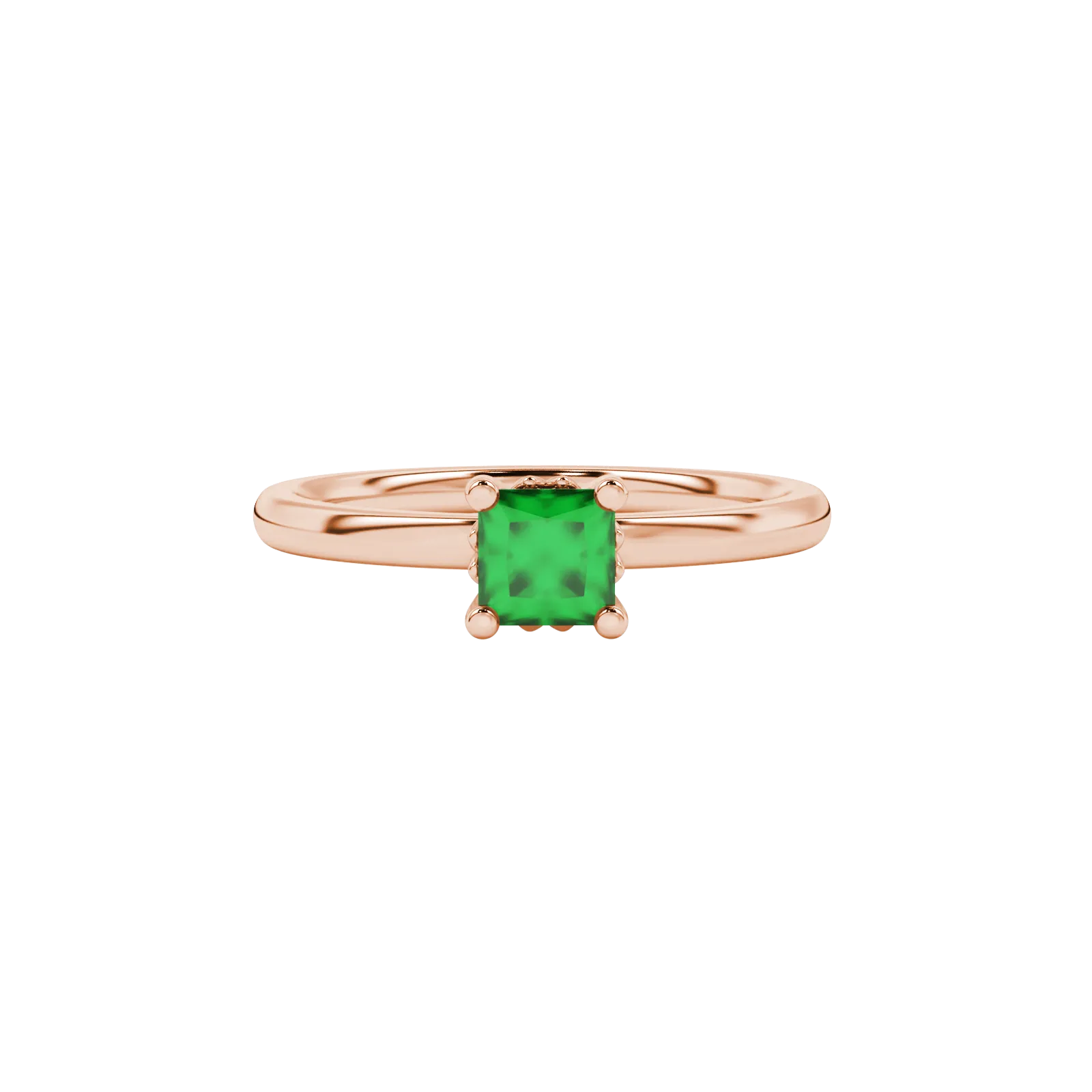 Close-up, princess emerald green gemstone ring, rose gold lotus setting.