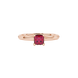 Close-up, princess raspberry red gemstone ring, rose gold lotus setting.