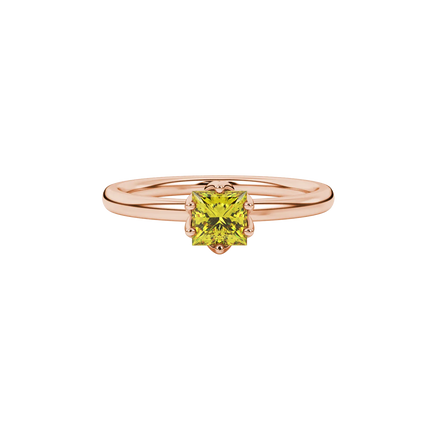 Close-up, princess canary yellow gemstone ring, rose gold scalloped setting.