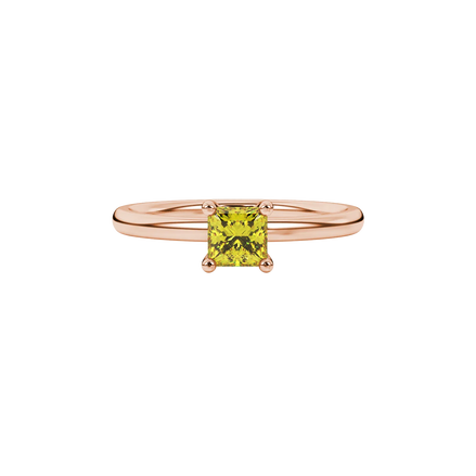 Close-up, princess canary yellow gemstone ring, rose gold surprise setting.