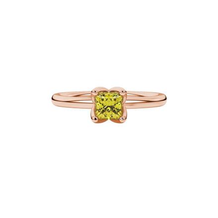 Close-up, princess canary yellow gemstone ring, rose gold tulip setting.