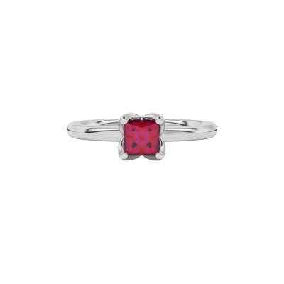 Close-up raspberry red gemstone ring, white gold tulip setting.