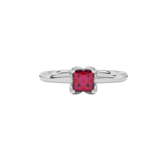 Close-up raspberry red gemstone ring, white gold tulip setting.