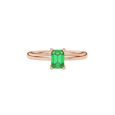 Emerald cut green gemstone solitaire ring in double band gold setting