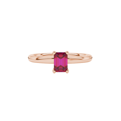 Emerald cut red gemstone solitaire ring with modern double shank design