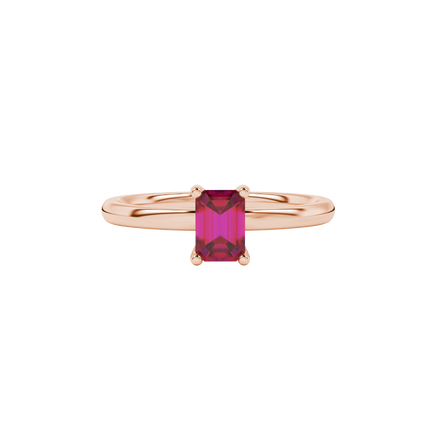 Emerald cut red gemstone solitaire ring with modern double shank design