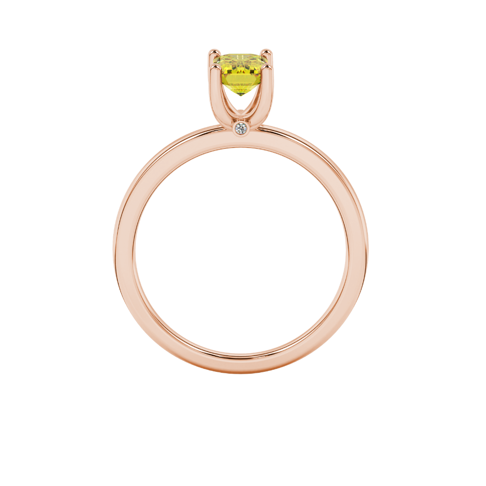Emerald cut yellow gemstone ring featuring elegant solitaire setting