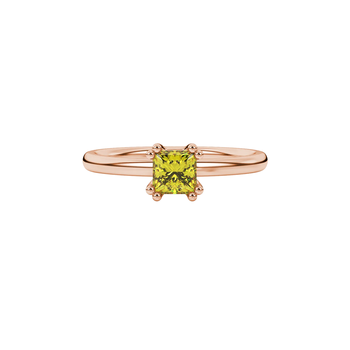 Close-up, princess canary yellow gemstone ring, rose gold vintage setting.