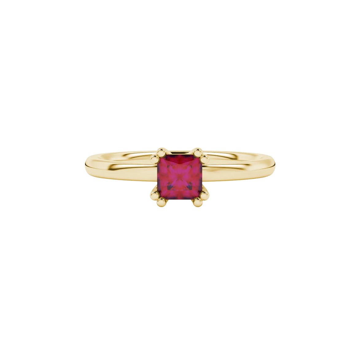 Close-up, princess raspberry red gemstone, yellow gold vintage ring.