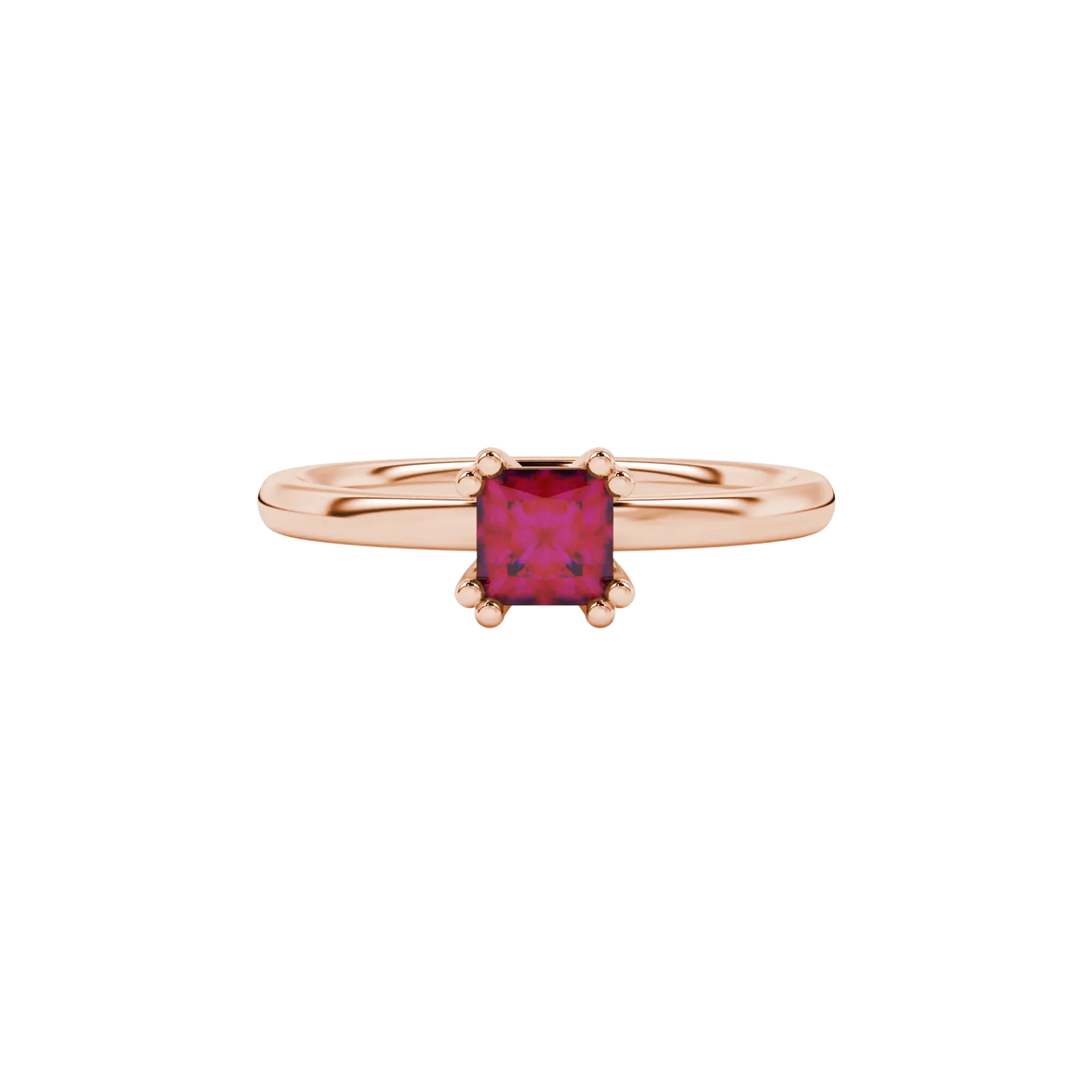 Close-up, princess raspberry red gemstone ring, rose gold vintage setting.