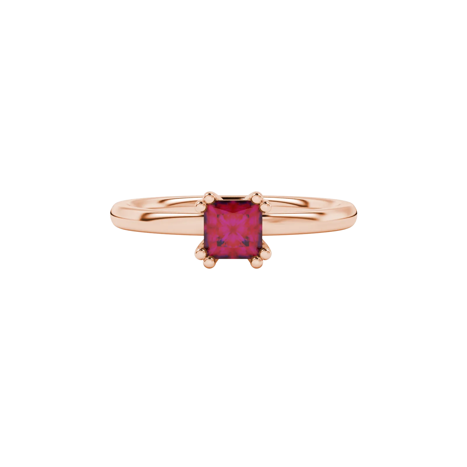 Close-up, princess raspberry red gemstone ring, rose gold vintage setting.