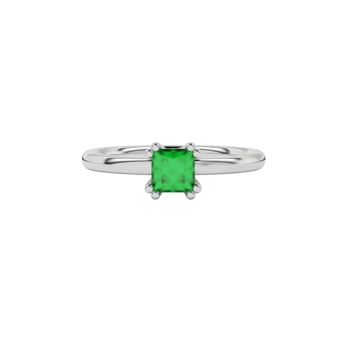 Close-up emerald green gemstone ring, white gold vintage setting.