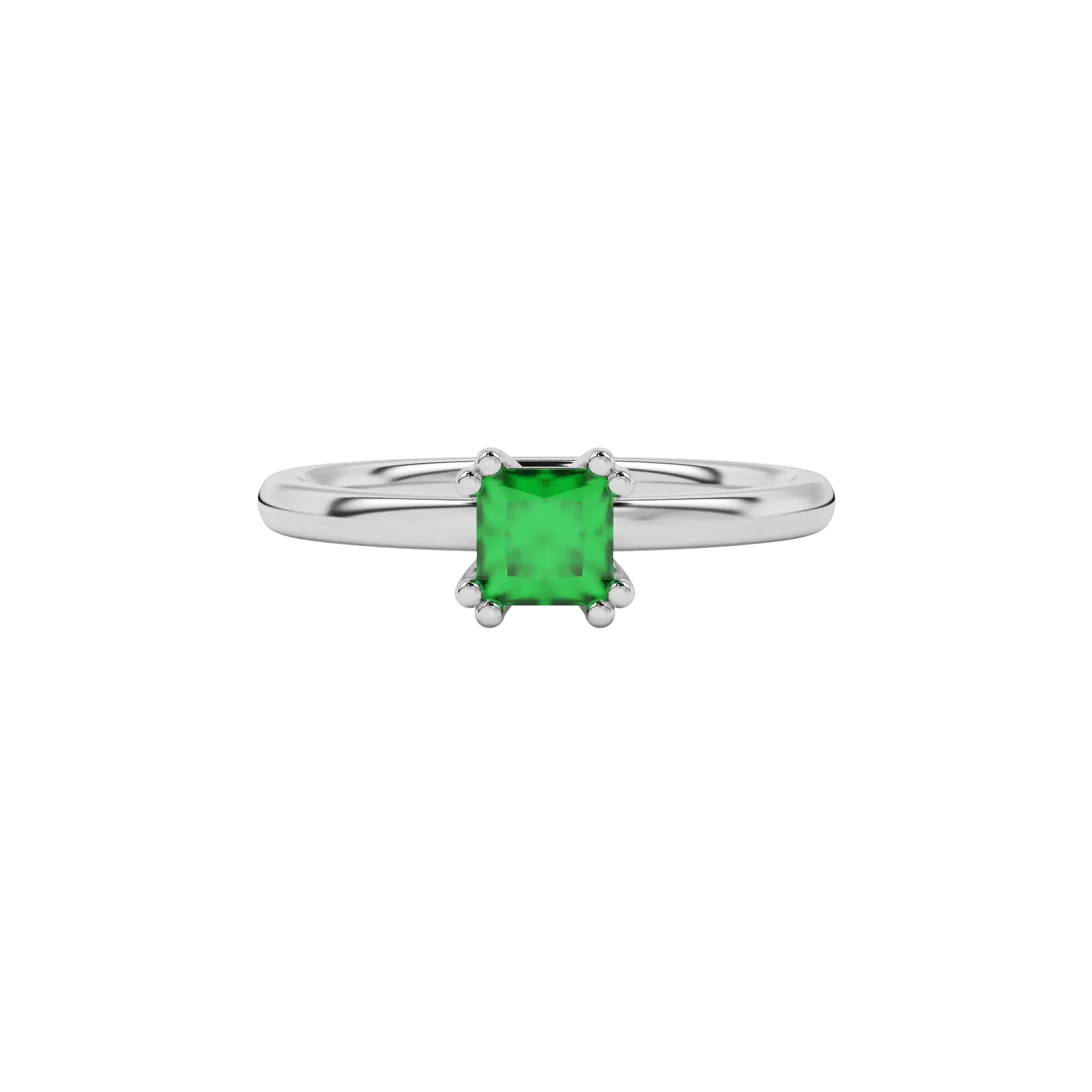 Close-up emerald green gemstone ring, white gold vintage setting.