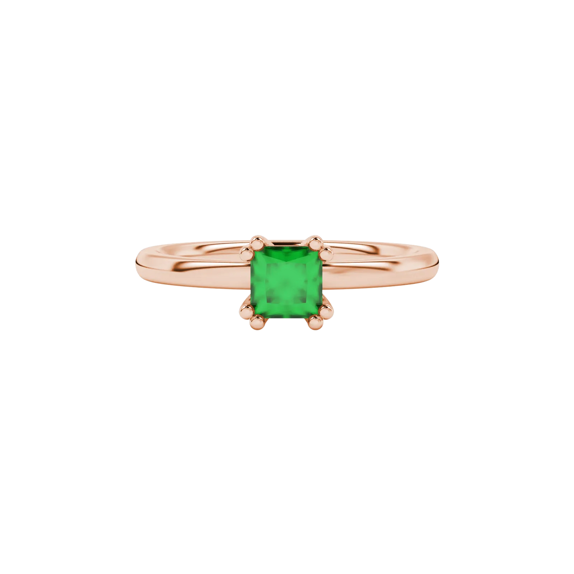 Close-up, princess emerald green gemstone ring, rose gold vintage setting.
