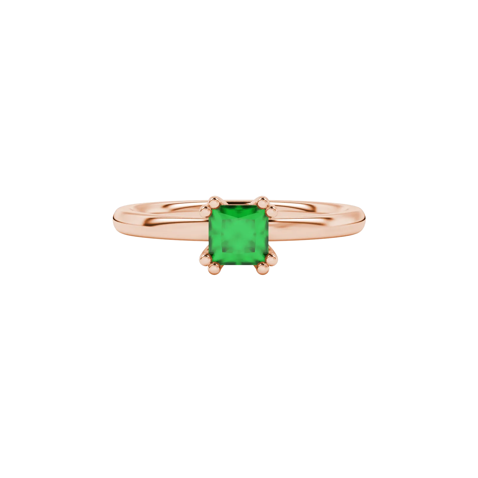 Close-up, princess emerald green gemstone ring, rose gold vintage setting.