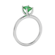Emerald cut green gemstone solitaire ring in double band gold setting