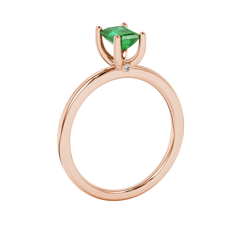 Emerald cut green gemstone solitaire ring in double band gold setting