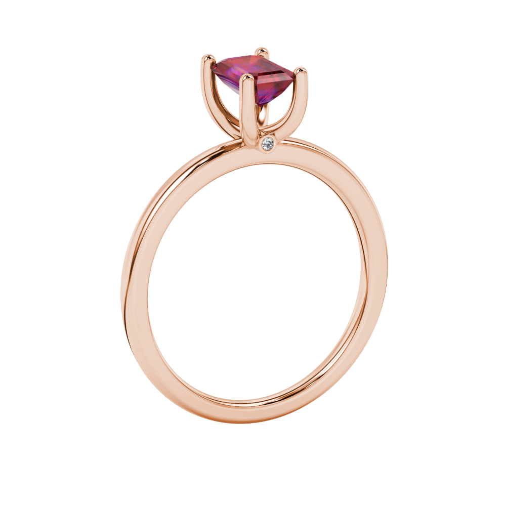 Emerald cut red gemstone solitaire ring with modern double shank design