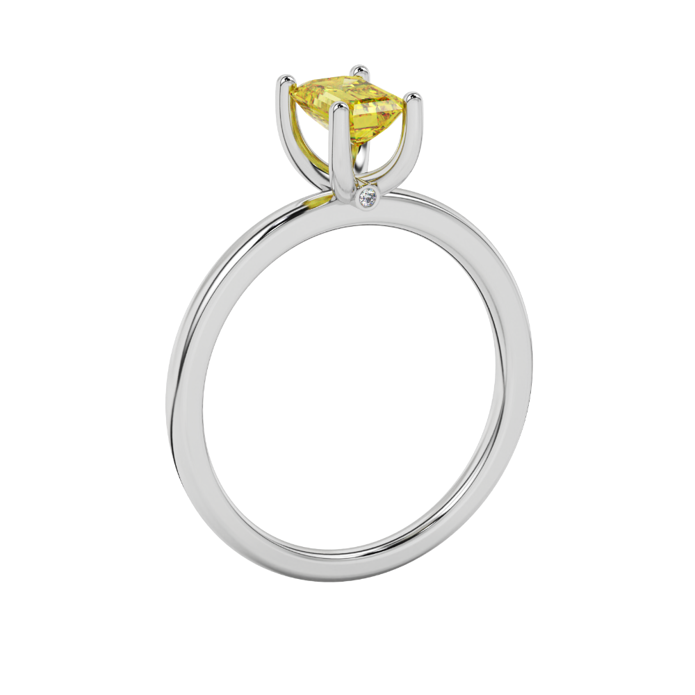 Emerald cut yellow gemstone ring featuring elegant solitaire setting