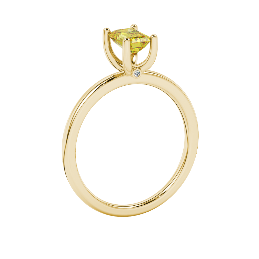 Emerald cut yellow gemstone ring featuring elegant solitaire setting