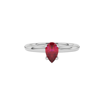 Close-up raspberry red gemstone ring, white gold four-prong setting.