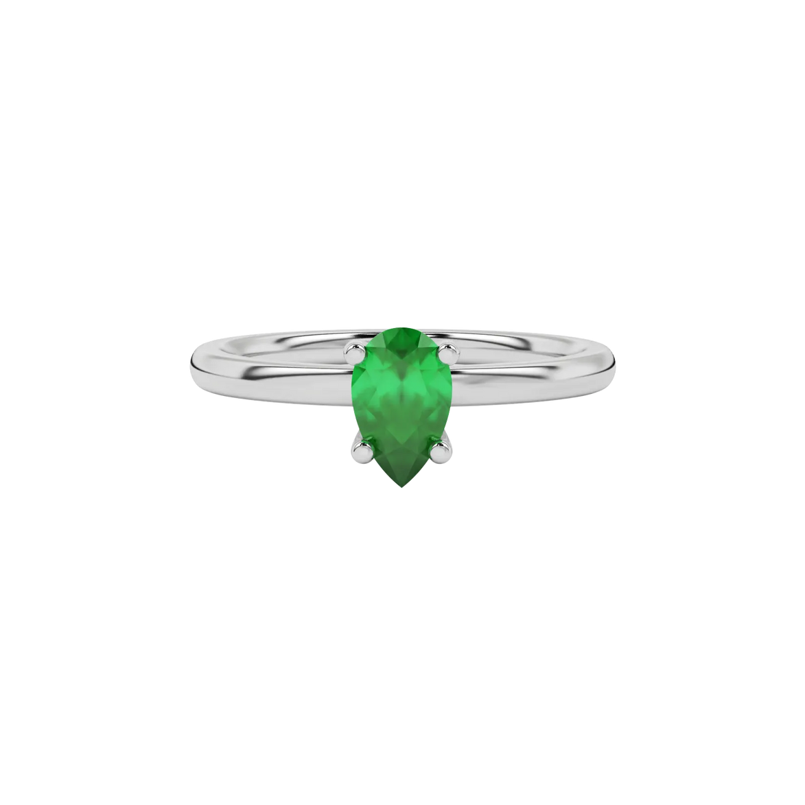 Close-up emerald green gemstone ring, white gold four-prong setting.