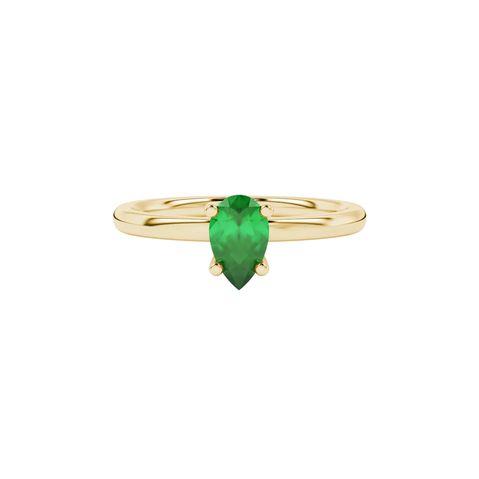 Close-up, pear shape emerald green gemstone, yellow gold four-prong ring.