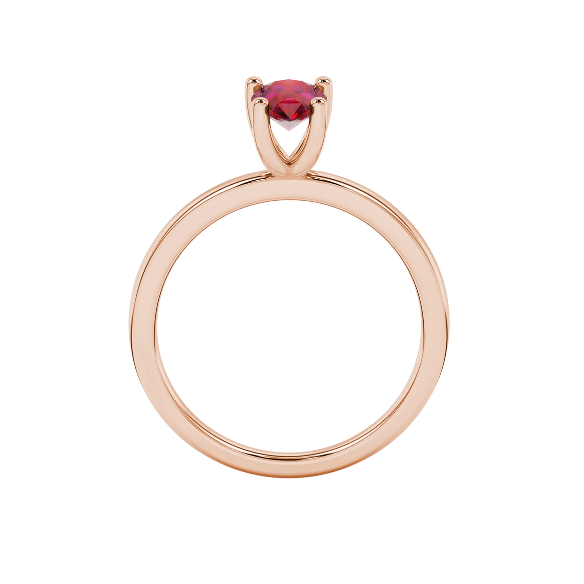 Pear shape raspberry red gemstone ring, rose gold four-prong setting.