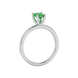 Side profile, white gold emerald green ring, four-prong gallery.