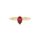 Close-up, pear shape raspberry red gemstone, yellow gold six-prong ring.