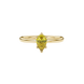 Close-up, pear shape canary yellow gemstone, yellow gold six-prong ring.
