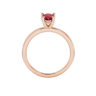 Pear shape raspberry red gemstone ring, rose gold classic basket setting.