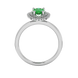 Pear shape emerald green gemstone ring, white gold falling edge halo setting.