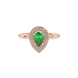 Close-up, pear shape emerald green gemstone ring, rose gold halo setting.