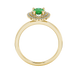 Pear shape emerald green gemstone ring, yellow gold falling edge halo setting.
