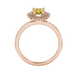 Pear shape canary yellow gemstone ring, rose gold falling edge halo setting.