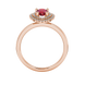 Pear shape raspberry red gemstone ring, rose gold falling edge halo setting.