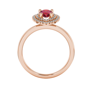 Pear shape raspberry red gemstone ring, rose gold falling edge halo setting.