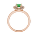 Pear shape emerald green gemstone ring, rose gold falling edge halo setting.