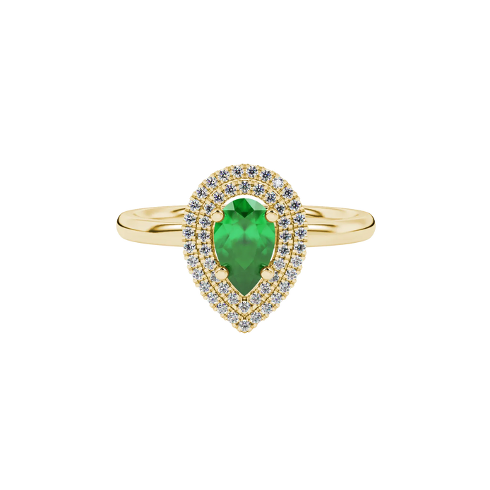 Close-up, pear shape emerald green gemstone, yellow gold halo ring.