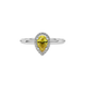Close-up canary yellow gemstone ring, white gold french pavé halo.