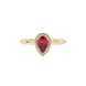 Close-up, pear shape raspberry red gemstone, yellow gold french pavé halo ring.