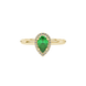 Close-up, pear shape emerald green gemstone, yellow gold french pavé halo ring.