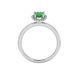 Pear shape emerald green gemstone ring, white gold french pavé halo setting.