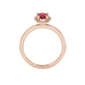 Pear shape raspberry red gemstone ring, rose gold french pavé halo setting.