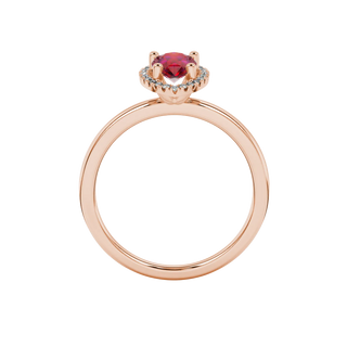 Pear shape raspberry red gemstone ring, rose gold french pavé halo setting.