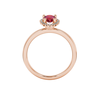 Pear shape raspberry red gemstone ring, rose gold french pavé halo setting.